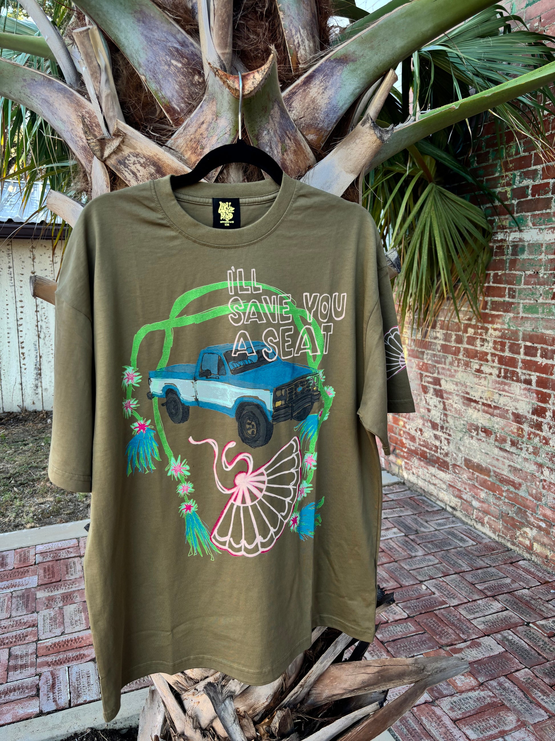 Pop The Clutch Graphic Tee