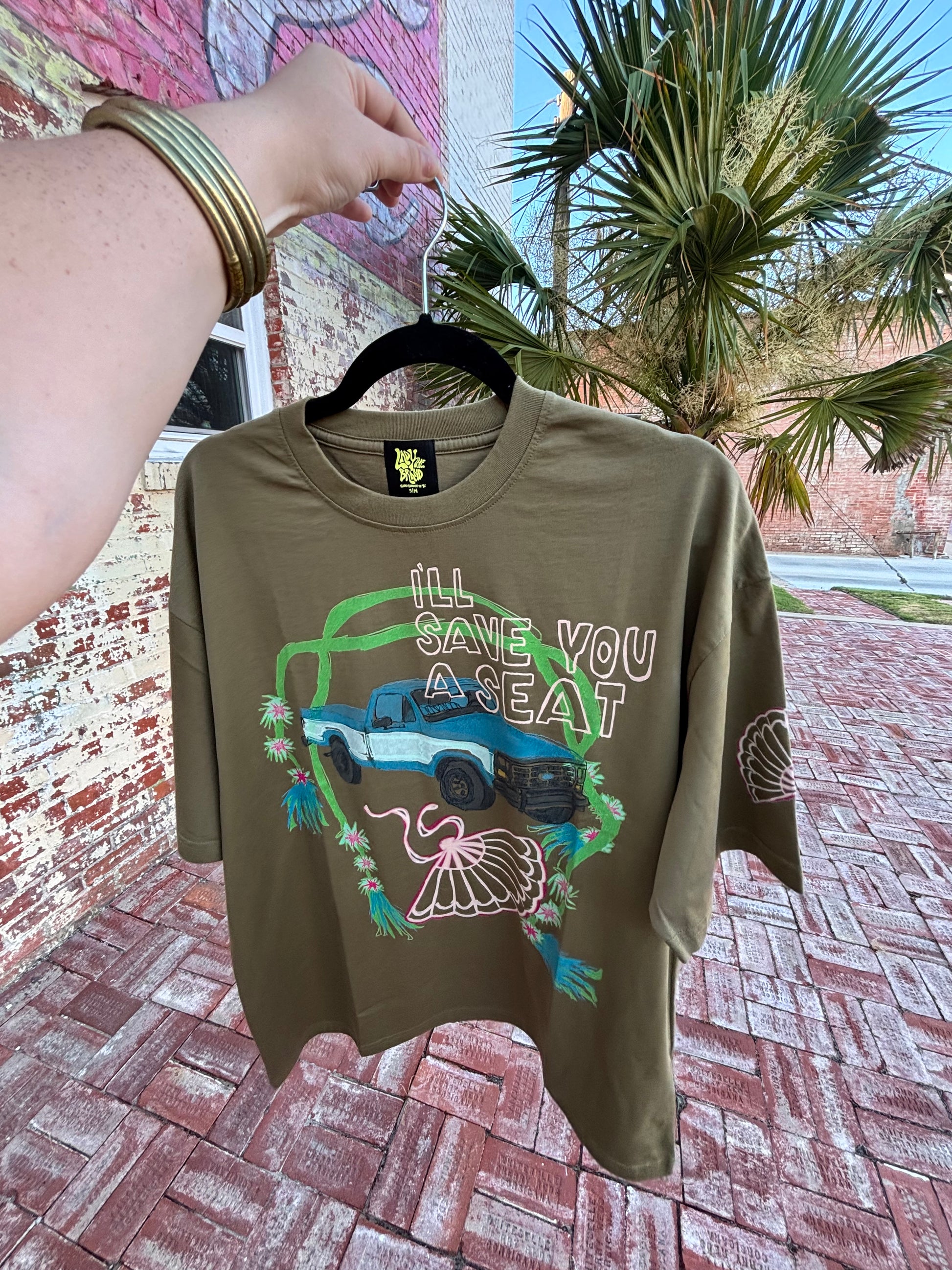 Pop The Clutch Graphic Tee